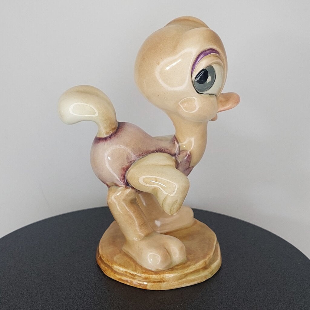 This is a David Hand's OSCAR OSTRICH Figurine 1154 of Animaland Series by Beswick England. 1949-1955
The Oscar Ostrich figurine is one of eight characters in David Hand's Animaland character series.
The figurine is 3-3/4 inches (9.5cm) tall.  
The backstamp is gold and reads: David Hand's Animaland, "Oscar Ostrich" Beswick England (circle) 35, Copyright by GB Animations Ltd.