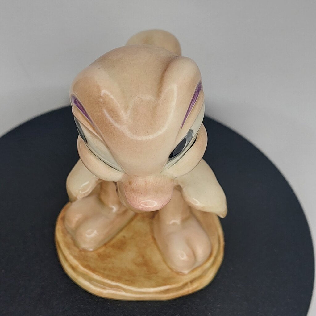 This is a David Hand's OSCAR OSTRICH Figurine 1154 of Animaland Series by Beswick England. 1949-1955
The Oscar Ostrich figurine is one of eight characters in David Hand's Animaland character series.
The figurine is 3-3/4 inches (9.5cm) tall.  
The backstamp is gold and reads: David Hand's Animaland, "Oscar Ostrich" Beswick England (circle) 35, Copyright by GB Animations Ltd.