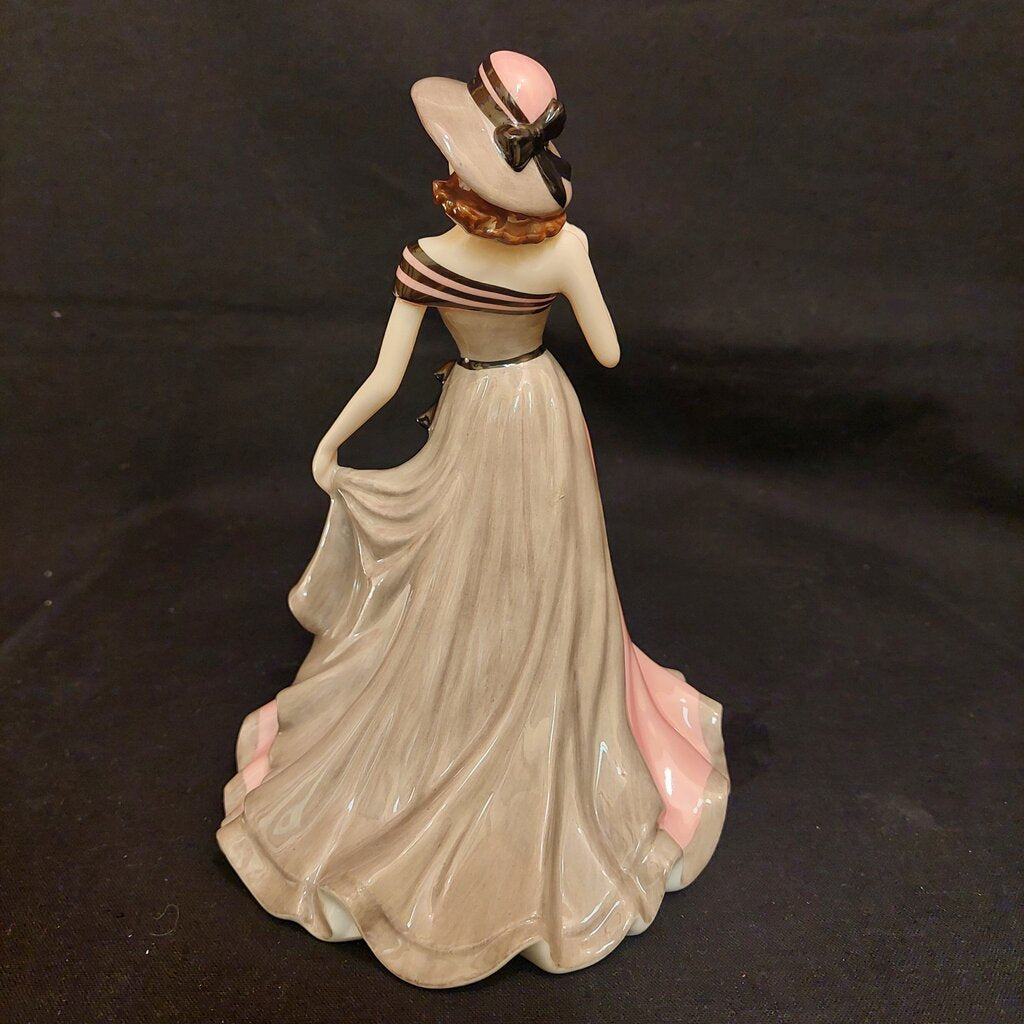 This is a Coalport Sentiments bone china figurine MY LOVE.
This Coalport figurine is 5 1/4 inches (13.25 cm) wide, 5 3/4 inches (14.5 cm) deep, and 7 inches (18cm) tall.
This figurine is a 2005 Sentiment Series of bone china ladies named MY LOVE.