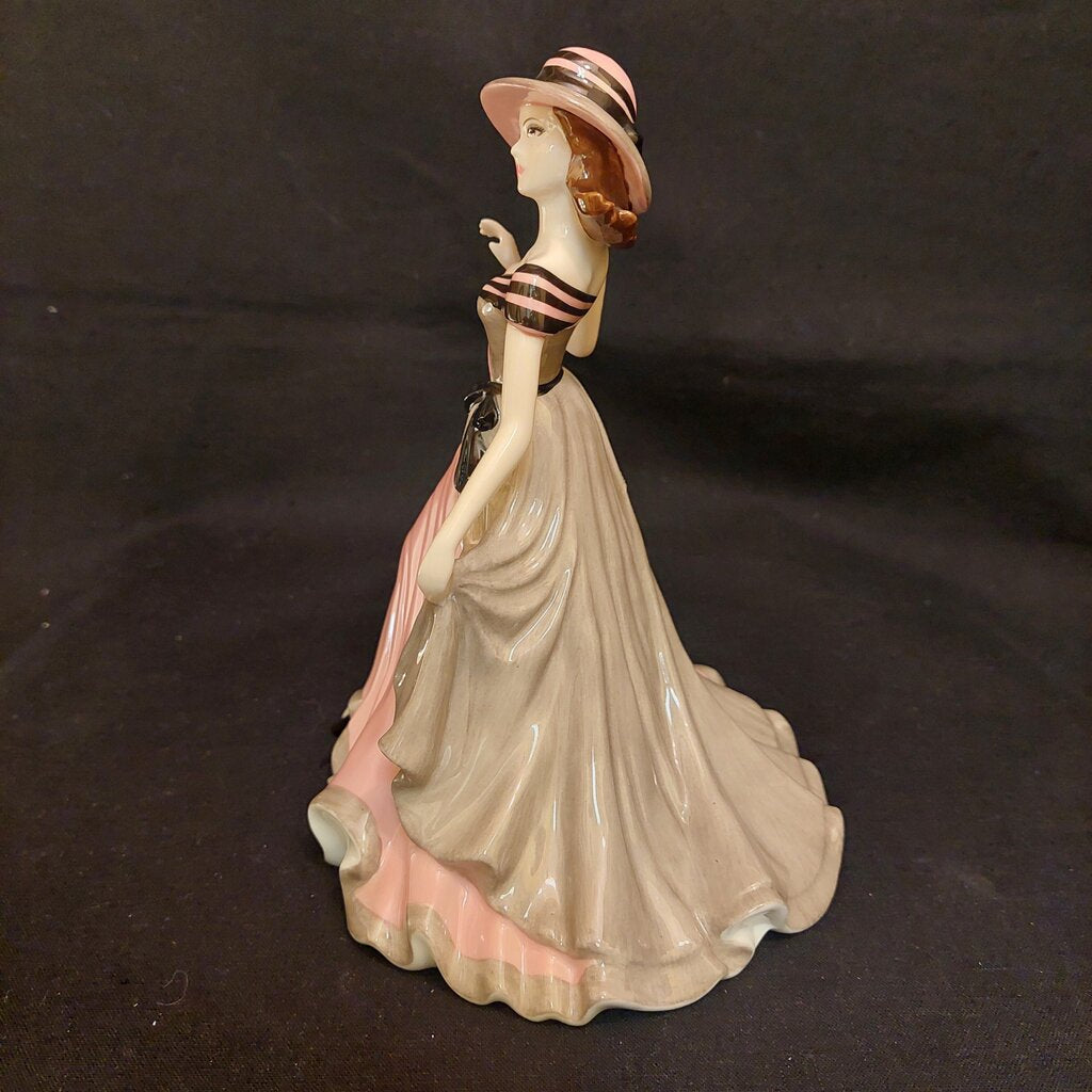 This is a Coalport Sentiments bone china figurine MY LOVE.
This Coalport figurine is 5 1/4 inches (13.25 cm) wide, 5 3/4 inches (14.5 cm) deep, and 7 inches (18cm) tall.
This figurine is a 2005 Sentiment Series of bone china ladies named MY LOVE.