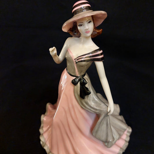 This is a Coalport Sentiments bone china figurine MY LOVE.
This Coalport figurine is 5 1/4 inches (13.25 cm) wide, 5 3/4 inches (14.5 cm) deep, and 7 inches (18cm) tall.
This figurine is a 2005 Sentiment Series of bone china ladies named MY LOVE.