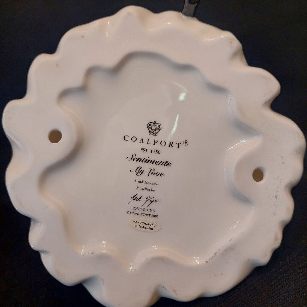 This is a Coalport Sentiments bone china figurine MY LOVE.
This Coalport figurine is 5 1/4 inches (13.25 cm) wide, 5 3/4 inches (14.5 cm) deep, and 7 inches (18cm) tall.
This figurine is a 2005 Sentiment Series of bone china ladies named MY LOVE.
