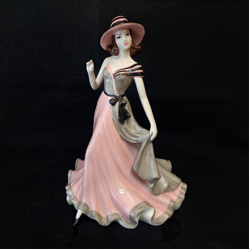 This is a Coalport Sentiments bone china figurine MY LOVE.
This Coalport figurine is 5 1/4 inches (13.25 cm) wide, 5 3/4 inches (14.5 cm) deep, and 7 inches (18cm) tall.
This figurine is a 2005 Sentiment Series of bone china ladies named MY LOVE.