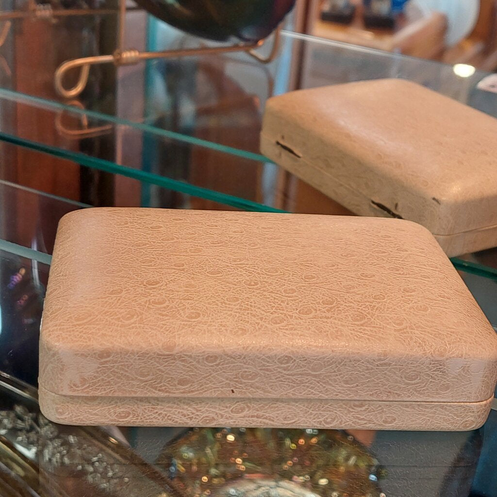 This is a rare vintage 1950s Sherman necklace, clip on earrings, and brooch set in an amazing mauve colour. The crystals are a unique mix of baguette, marquise, round, and teardrop cuts. The 4 piece set comes in their original hinged box.