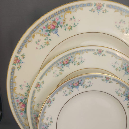 Set of decorative plates with floral patterns on a dark background
