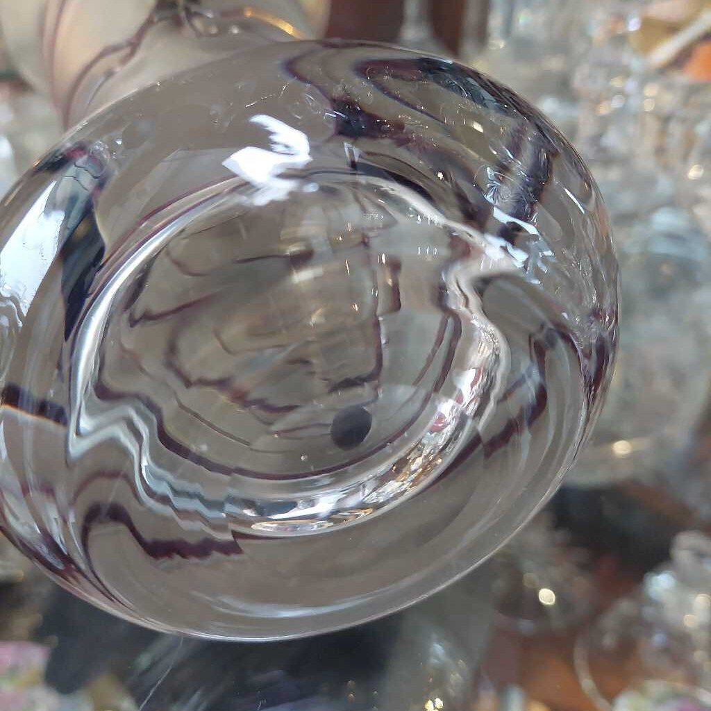 This is a 1960s - 70s Poschinger blown art glass vase. This piece is associated with Baron Von Poschinger and is hand blown with applied glass threads. 
The vase is iridescent with purple threads. 
The vase is 4.75 inches (12cm) wide at the top and is 10 inches (25.5cm) tall.
The vase is heavy at the bottom and opens to a flared rim.
A recognized Baron Von Poschinger design. 
In excellent condition. No chips, no cracks, no scratches, no repairs.