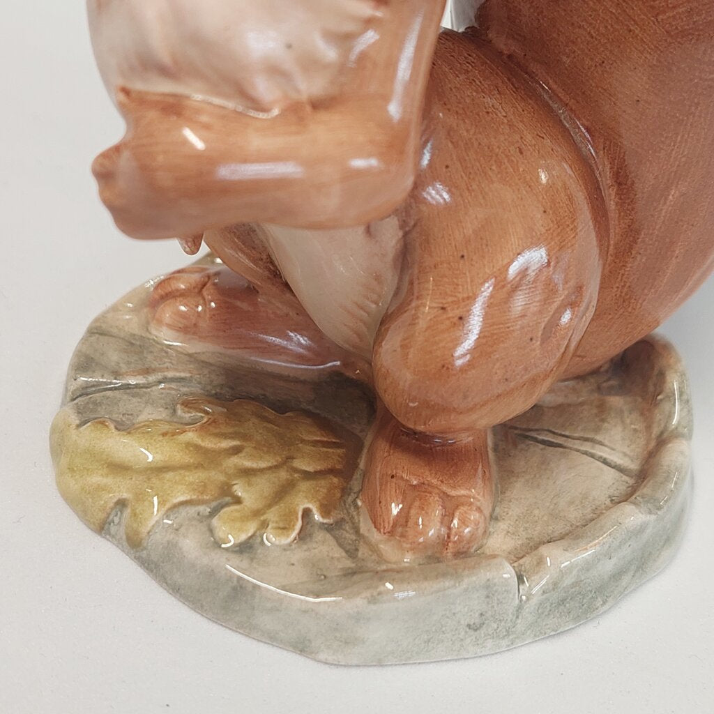 This is a David Hand's&nbsp;Ginger Nutt figurine&nbsp;1152 of Animaland Series by Beswick England. 1949-1955

The Ginger Nutt figurine is one of eight characters in David Hand's Animaland character series. Ginger Nutt is a red squirrel.

The figurine is&nbsp;3-1/2 inches (9cm) tall.&nbsp;&nbsp;

The backstamp is gold and reads: David Hand's Animaland, "Ginger Nutt" Beswick England (circle) 6, Copyright by GB Animations Ltd.