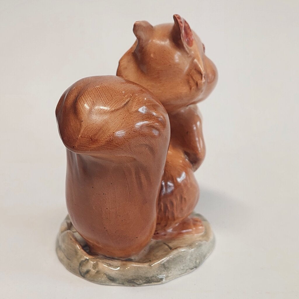 This is a David Hand's&nbsp;Ginger Nutt figurine&nbsp;1152 of Animaland Series by Beswick England. 1949-1955

The Ginger Nutt figurine is one of eight characters in David Hand's Animaland character series. Ginger Nutt is a red squirrel.

The figurine is&nbsp;3-1/2 inches (9cm) tall.&nbsp;&nbsp;

The backstamp is gold and reads: David Hand's Animaland, "Ginger Nutt" Beswick England (circle) 6, Copyright by GB Animations Ltd.