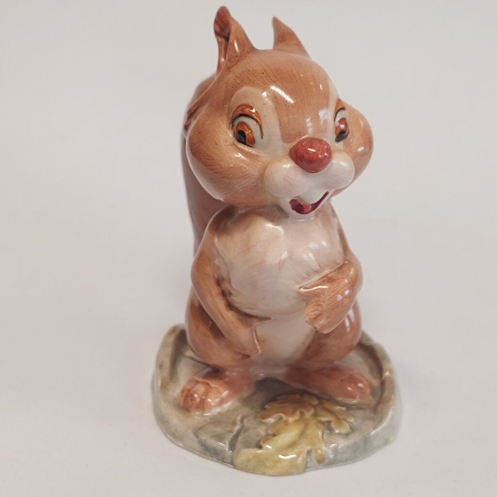 This is a David Hand's Ginger Nutt figurine 1152 of Animaland Series by Beswick England. 1949-1955

The Ginger Nutt figurine is one of eight characters in David Hand's Animaland character series. Ginger Nutt is a red squirrel.

The figurine is 3-1/2 inches (9cm) tall.