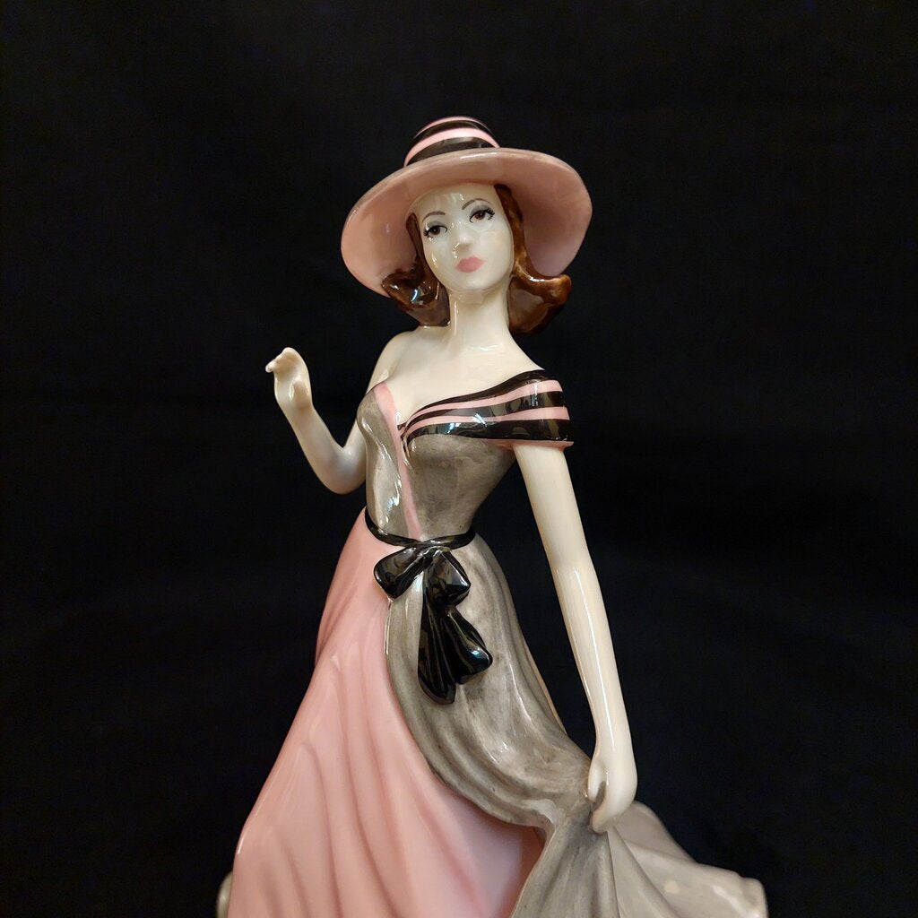 This is a Coalport Sentiments bone china figurine MY LOVE.

This Coalport figurine is 5 1/4 inches (13.25 cm) wide, 5 3/4 inches (14.5 cm) deep, and 7 inches (18cm) tall.

This figurine is a 2005 Sentiment Series of bone china ladies named MY LOVE.
