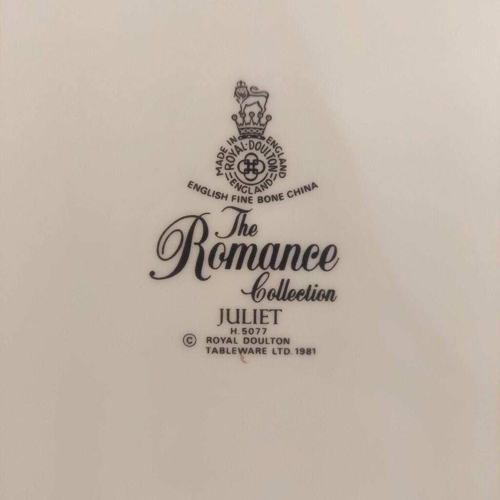 Royal Doulton branding and 'The Romance Collection' text on a beige background