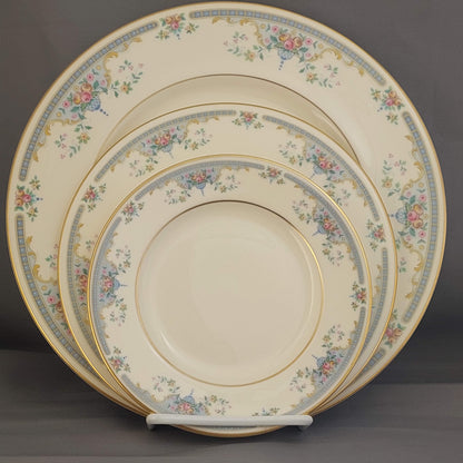 Set of decorative plates with floral patterns on a dark background