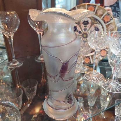 This is a 1960s - 70s Poschinger blown art glass vase. This piece is associated with Baron Von Poschinger and is hand blown with applied glass threads.&nbsp;

The vase is iridescent with purple threads. 
The vase is 4.75 inches (12cm) wide at the top and is 10 inches (25.5cm) tall.

The vase is heavy at the bottom and opens to a flared rim.

A recognized Baron Von Poschinger design. 

In excellent condition. No chips, no cracks, no scratches, no repairs.