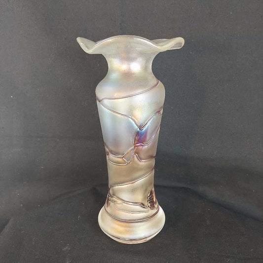 This is a 1960s - 70s Poschinger blown art glass vase. This piece is associated with Baron Von Poschinger and is hand blown with applied glass threads.&nbsp;

The vase is iridescent with purple threads. 
The vase is 4.75 inches (12cm) wide at the top and is 10 inches (25.5cm) tall.

The vase is heavy at the bottom and opens to a flared rim.

A recognized Baron Von Poschinger design. 

In excellent condition. No chips, no cracks, no scratches, no repairs.